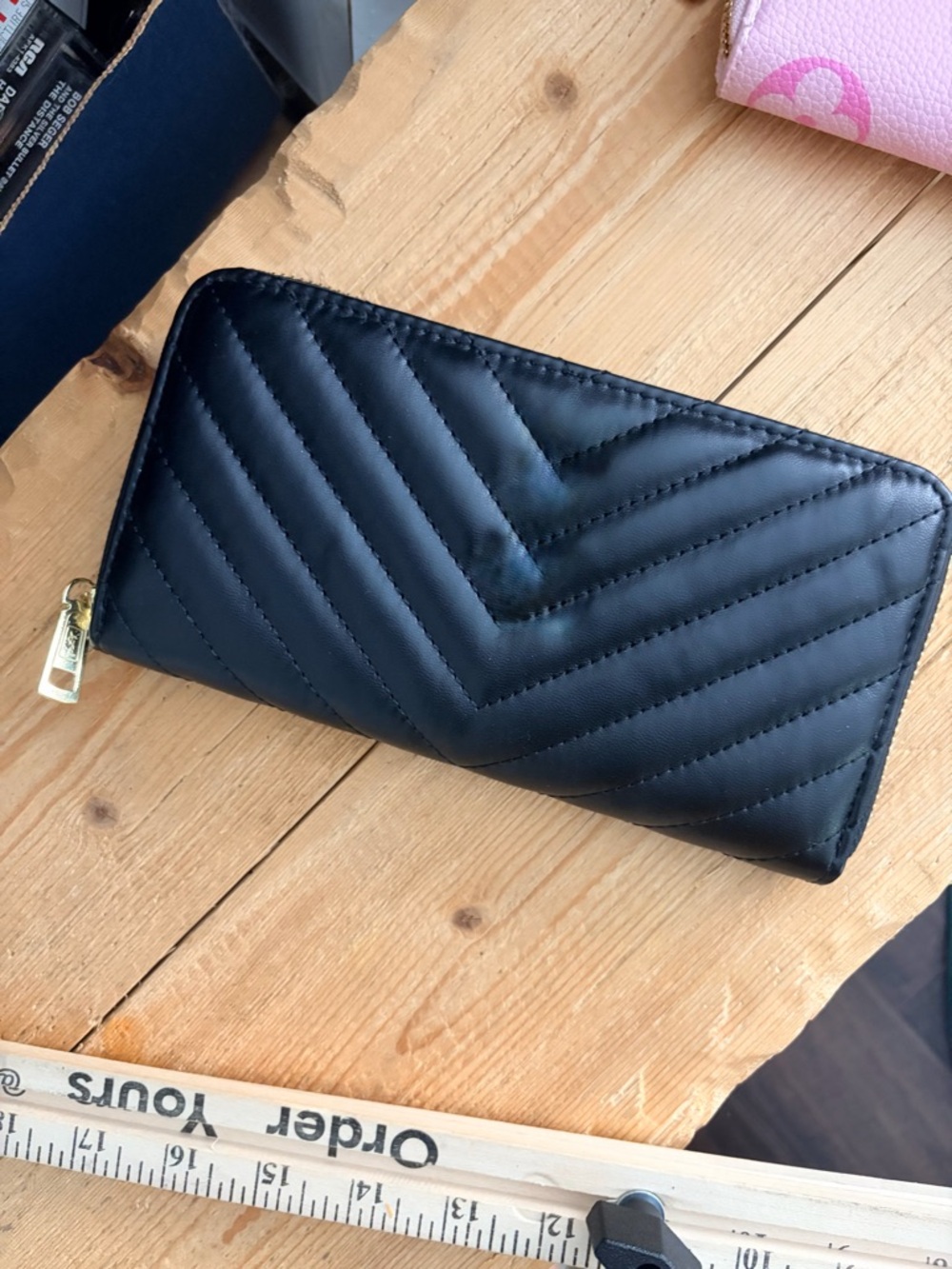 Black YSL Cassandre matelassé  zip-around wallet CHEVRON RIBBED